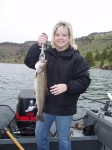 Evelyn McKim with her killer 6.5 Lb. bull trout from a recent guide trip.